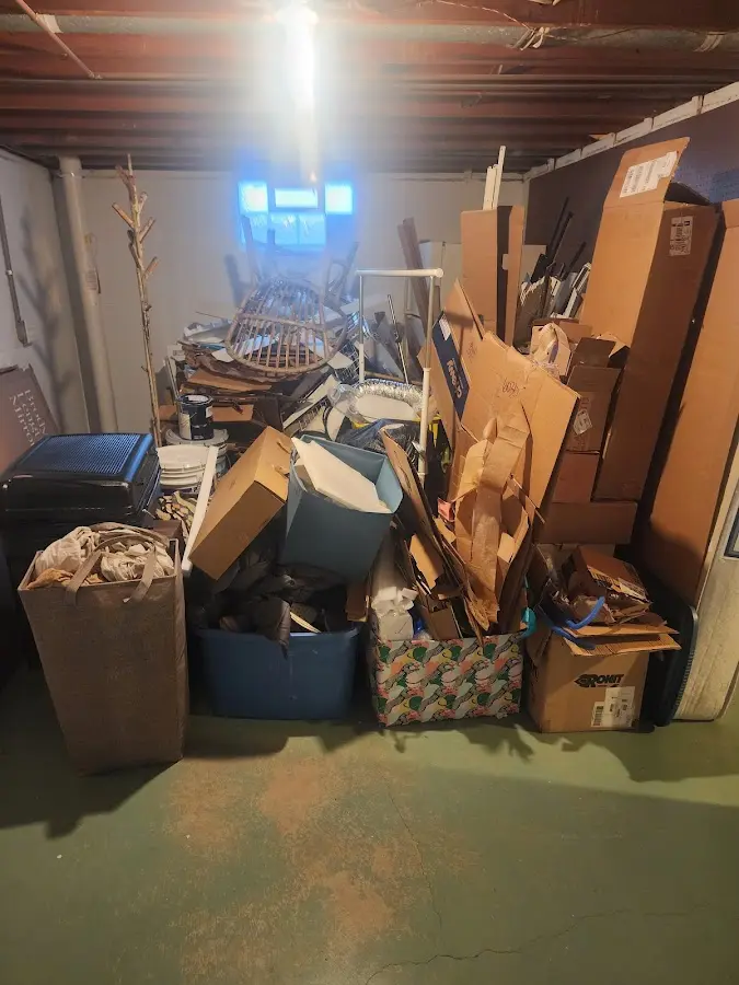 Roll-off dumpster container at job site for 20 Yard Dumpster Rental in Trafford